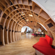 Illustration for article titled This gorgeous office has an endless desk made by robots